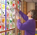 Viki Keating working on a stained glass window