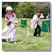 Two children spinning hoops