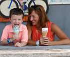 Mother and son enjoying an ice cream cone 