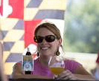 Woman drinking a glass of beer